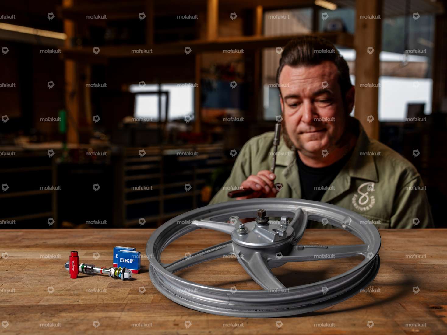 Siggnature hub revision (grooved ball bearing) cast front wheel | Piaggio Ciao Carousel Image 1